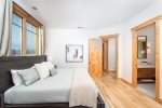 Bedroom 2 offers a king bed, private television, patio access & luxurious ensuite bathroom. 
